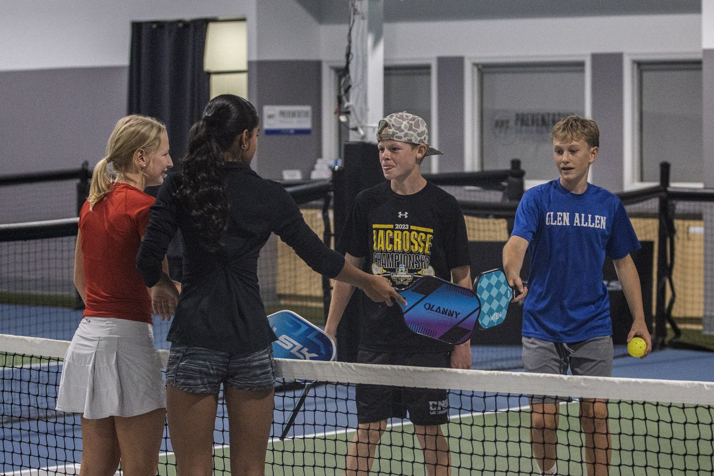 Players meeting at the net before a match